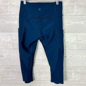 Athleta XS All In Capri Crop Leggings Stash Pockets Mesh High Rise Teal Active